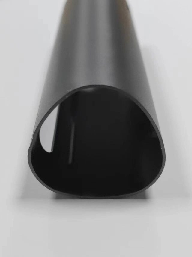Black anodized aluminum tube with a matte finish
