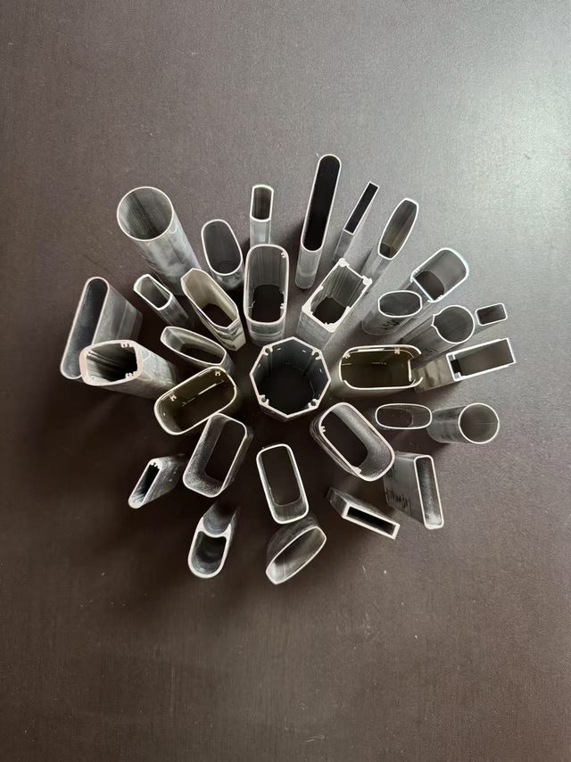Family of extruded aluminum profile sections of different shapes