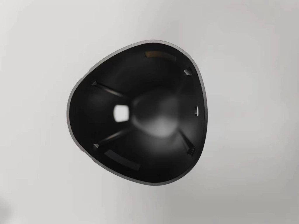 Thin-wall aluminum housing section in black anodized finish