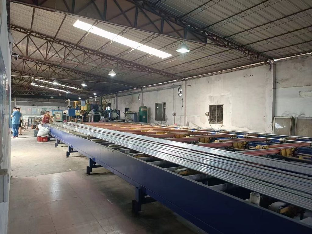 Extrusion hall floor with the press line and profile handling equipment